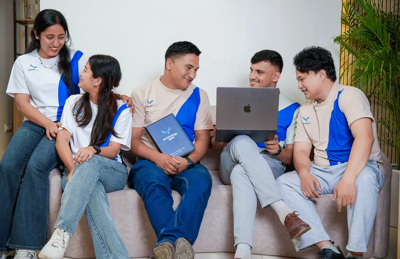 Team members relaxing together in the Technology Spot office